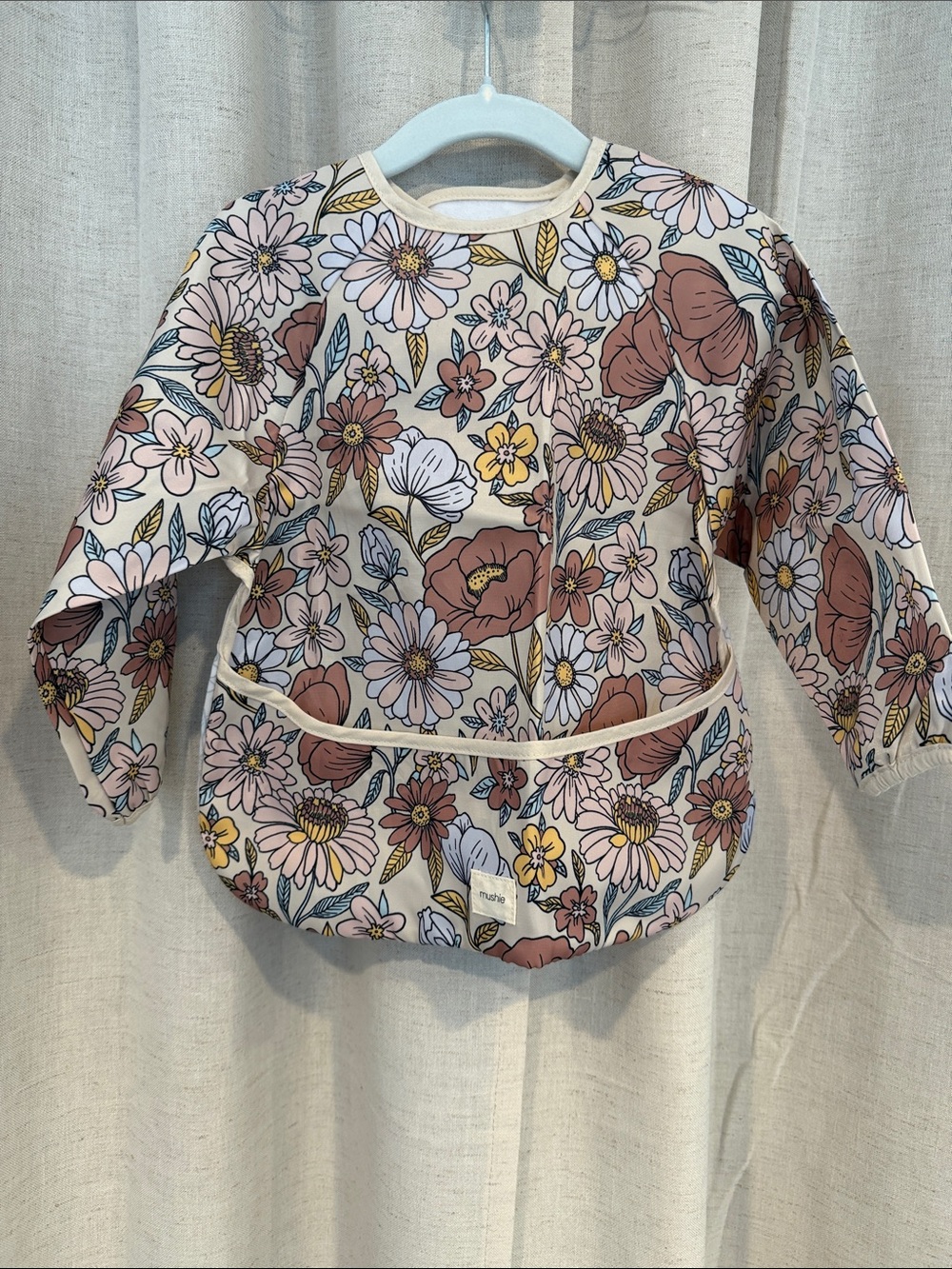 Mushie Long Sleeve Floral Baby Bib Cream and Pastel Flowers